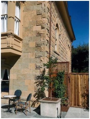 After: corner at location of hospital annex with reconstructed oriel window